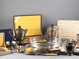 a lot of silver items that are on a table