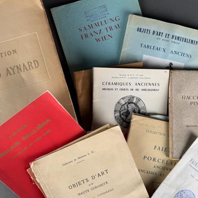 many books that are sitting together on a table
