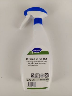 a bottle of disson etha plus on a white surface