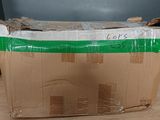 a cardboard box that is sitting on top of a table