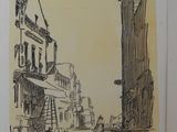drawing of a street scene with buildings and a person walking down the street