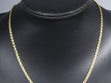 a gold chain necklace on a mannequin mannequin mannequin mannequin mannequin mannequin mannequin mannequin manne
