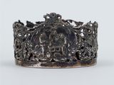 an antique silver ring with a picture of a man and a woman on it