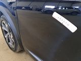 a close up of a car with a sticker on the side of it
