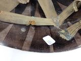 a close up of a military helmet with a tag on it