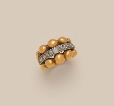 a gold and diamond ring