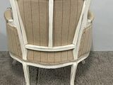 a chair that is sitting in the corner of a room