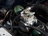 a close up of a car ' s engine with its hood open