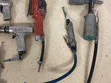 a lot of tools that are sitting on a table