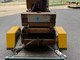an image of a trailer with luggage on the back