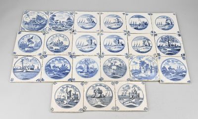 many blue and white plates with different designs on them