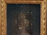 un cadre doré contenant la photo d'une femme