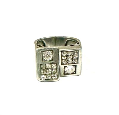 an image of a silver ring with diamonds on a white background