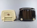 an image of a black and white toaster and a toaster on a table