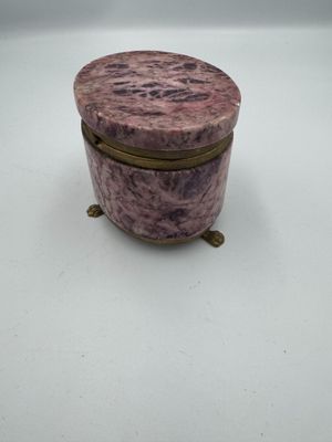 an image of a purple marble box sitting on top of a white table