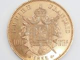 l'image d'une pièce d'or sur laquelle figurent des armoiries