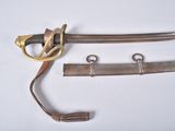 an image of a pair of swords on a white surface