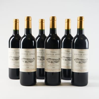 six bottles of red wine lined up in a row