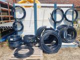 a lot of hoses that are sitting on a pallet