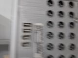 a close up of a metal grater with holes in it