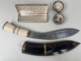 a knife and other items that are on a table