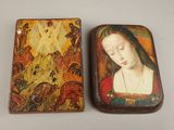 pair of wooden boxes with paintings of a woman and a man