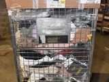 a metal cart with many items in it in a warehouse