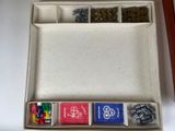 a box with several different items in it on a table