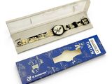 a box with a watch and a bottle opener in it