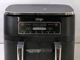 an air fryer that is sitting on a counter