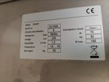 a label on the back of a refrigerator that says electric shock