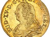 une pièce d'or sur laquelle figure le portrait d'un homme de profil