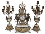 three different sized clocks with angels on each of them