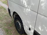 a white van that is parked on the side of the road