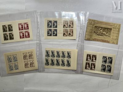 several different types of stamps are displayed in a display case