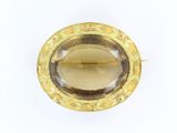 an image of a yellow gold ring with a faceted smokye stone