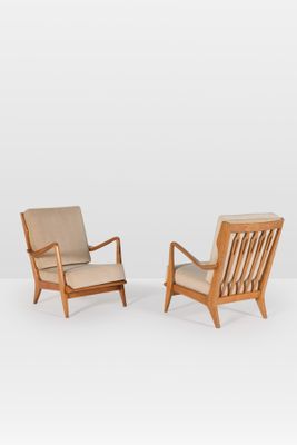 pair of mid - century danish lounge chairs