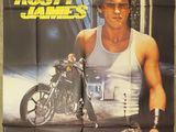 the poster for the movie rusty james is hanging on the wall