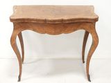 an image of a small wooden table with a drawer underneath it
