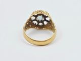 an image of a close up of a ring on a white surface