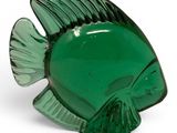 green glass fish shaped dish on a white background