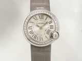 an image of a close up of a wrist watch with roman numerals