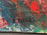 an image of a painting with red and green paint on it
