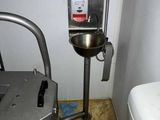 a toilet and a sink in a small room