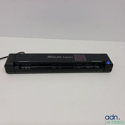 an image of a black scanner sitting on top of a white table