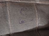 a close up of a piece of fabric with a tag on it