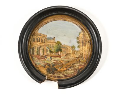 un vieux tableau représentant une scène urbaine, dans un cadre noir