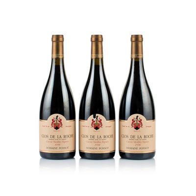 three bottles of red wine on a white background