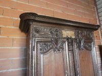 Armoire normande en chêne mouluré et richement sculpté de bo… (photo 5)