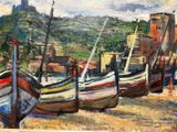 de nombreux bateaux alignés sur la plage